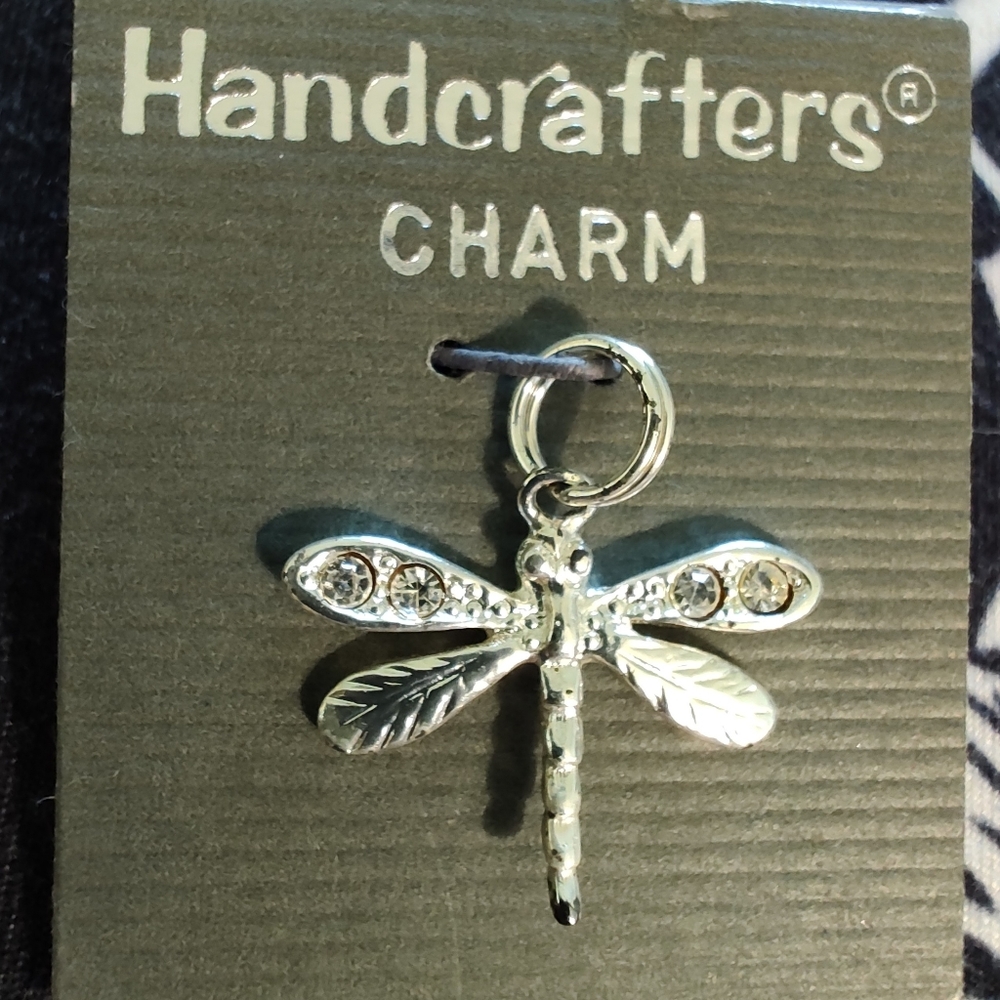 Sterling silver dainty Dragonfly Charm.  4 Austrian crystals on the wings.  NWT